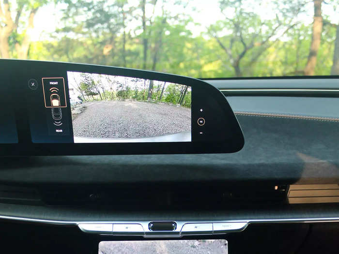 The multiple screens come in mighty handy when parking, though. The upper display shows the backup camera while the lower one shows a 360-degree view.