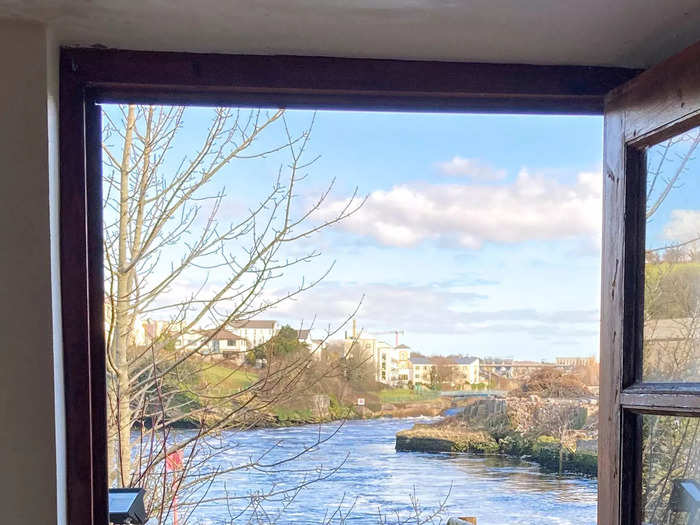 The kitchen opens right to a deck on the water.