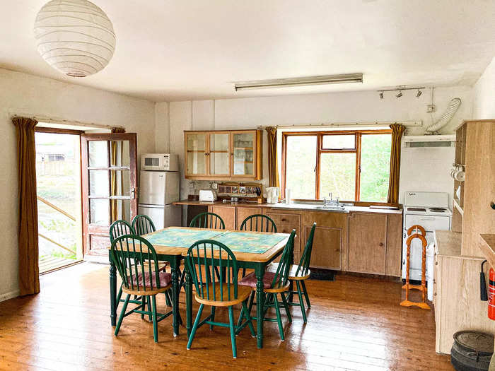 The kitchen is also bright and charming.