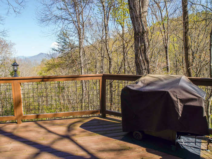 It was full of amenities to help me relax and enjoy the view, from a patio with a grill and hot tub ...