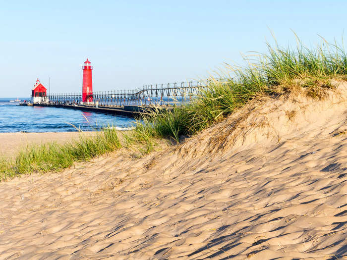 Thrillist described Grand Haven state park in Michigan as "arguably the grandest Michigan beach town of all."