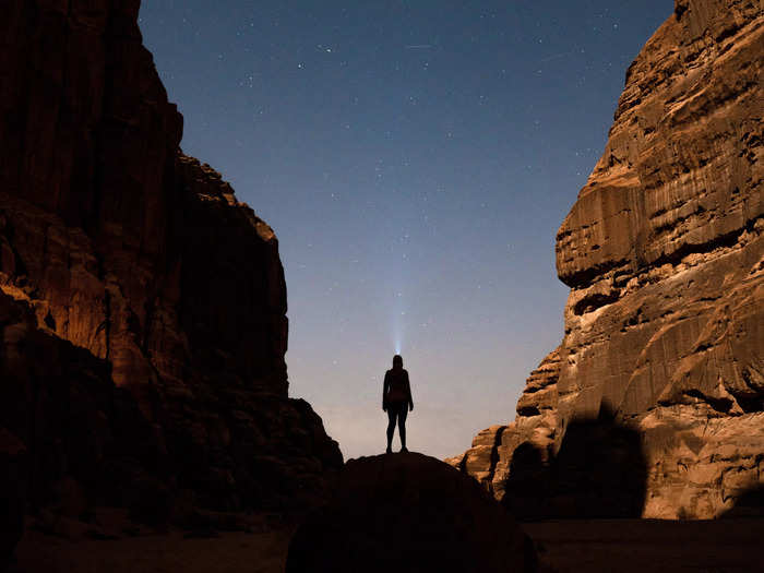 The images present the desert site as a place of mystery and wonder