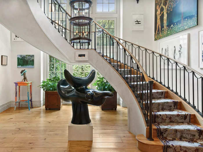 The home itself was designed by architectural firm Shope Reno Wharton. The entryway features 12-foot-high ceilings and leads to the second floor, with four suites.