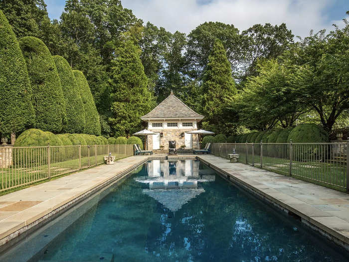 The 70-foot lap pool is off the home