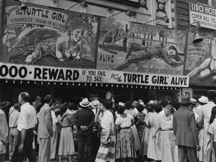 Coney Island was home to a variety of performers, like the one pictured below. Today, the Coney Island Circus Sideshow still exists, and features acts such as sword swallowers and fire eaters.