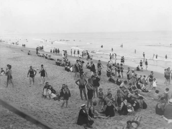 These visitors relaxed and socialized by the ocean in the summer of 1925.