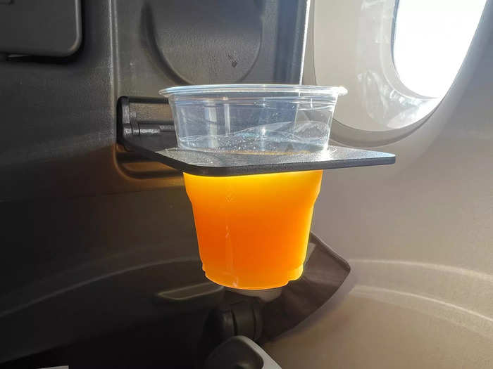 …as well as a convenient cup holder on the seatback, meaning I didn