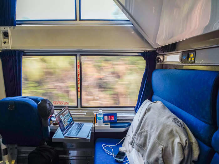 The bedroom that I booked through Amtrak was a 45-square-foot space with a sofa that folded out into a bed, a bed that pulled down from the ceiling, and a chair that folded up out of the way.