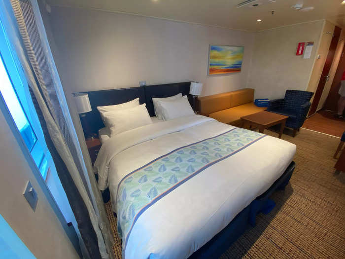 The key to sharing a cruise room this size is to stay organized and make the most of the space.