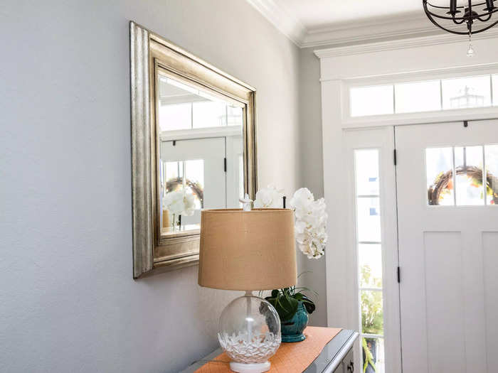 An entryway mirror with a drop zone is much needed.