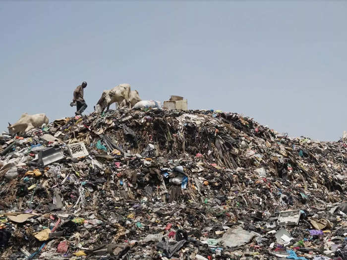 These landfills overflow into the cities open sewage system which can contribute to flooding and create a public health crisis. The landfills become a breeding ground for mosquitoes that spread malaria. Rainwater soaking in the stacks of clothes can also spread cholera.