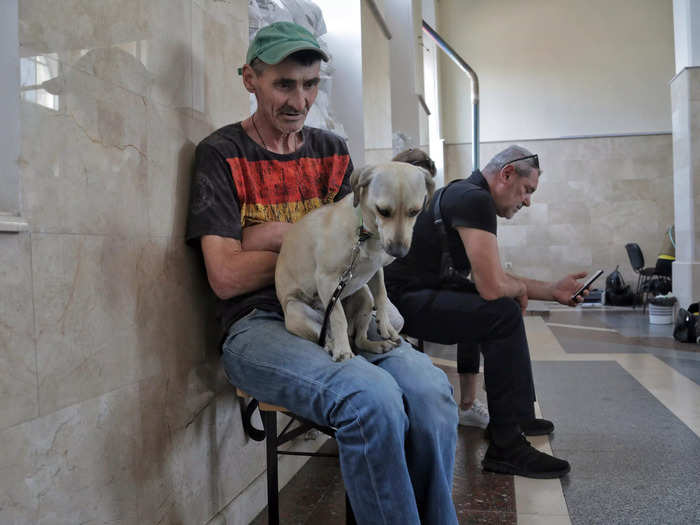 And this man brought a dog with him to the train station.