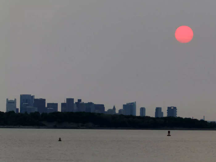 At sunset in Boston on Tuesday, the sun glowed an ominous red.