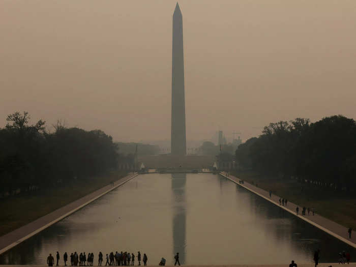 In Washington, DC, tourists still visited the Washington Monument.