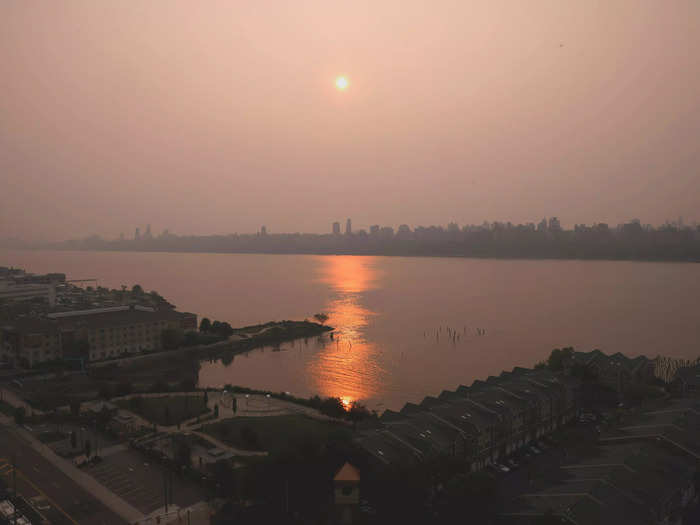 The Manhattan skyline struggled to be seen through the smoke from Guttenberg, NJ, on Tuesday morning.