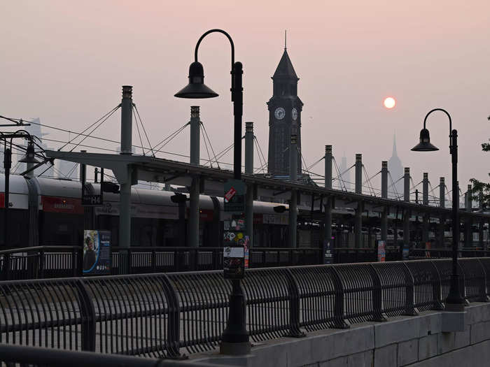 From Jersey City, New Jersey, the New York City skyline could hardly be seen on Wednesday morning as commuters traveled to work.