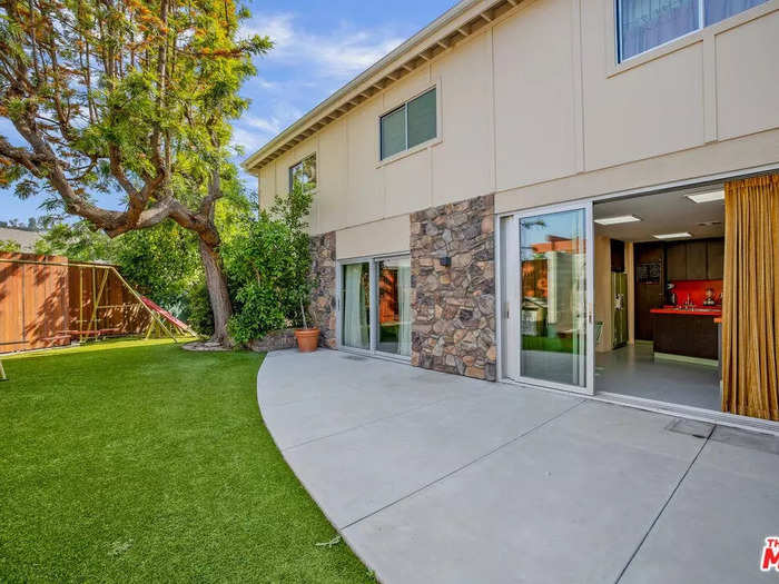 The citrus trees that line the backyard of "The Brady Bunch" home also come with the property, although maintenance is up to the owner.