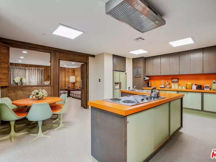 Another feature that might evoke memories of old: The bright orange Formica kitchen counters, which look nearly identical to the original set