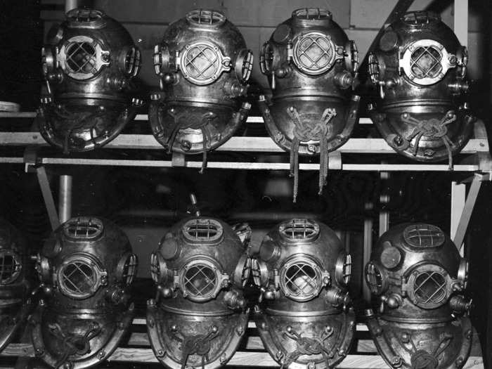 For decades afterwards, divers wore bulky suits made of heavy materials like canvas, with massive metal helmets, lead belts weighing around 60 pounds and shoes with lead soles weighing about 18 pounds.