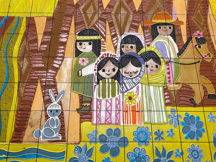 Inside the lobby is a massive mural designed by Mary Blair, one of the designers behind It