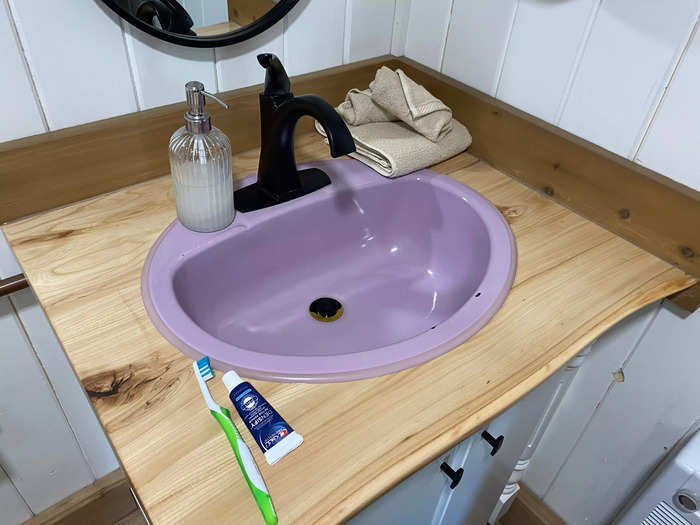 The online listing said the space has a "purple sink and toilet." The toilet wasn