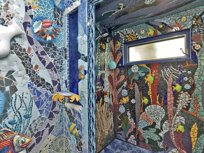 The ocean-themed bathroom was completed with the help of some friends over different periods of time, Frank said.