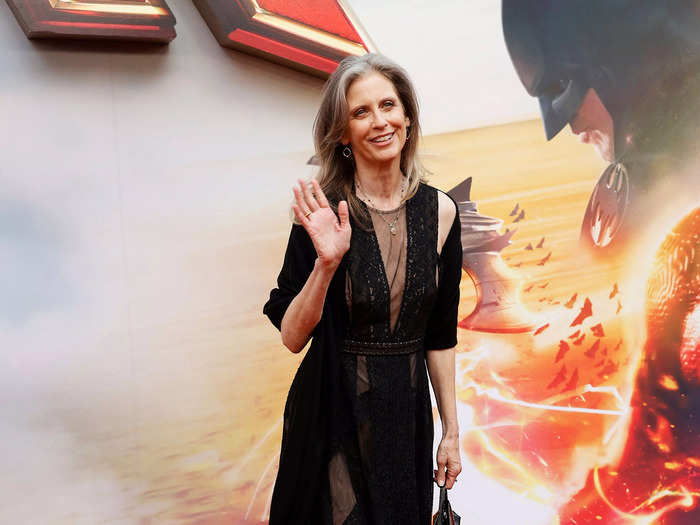Original "Supergirl" star Helen Slater arrived in a netted black dress and boots.