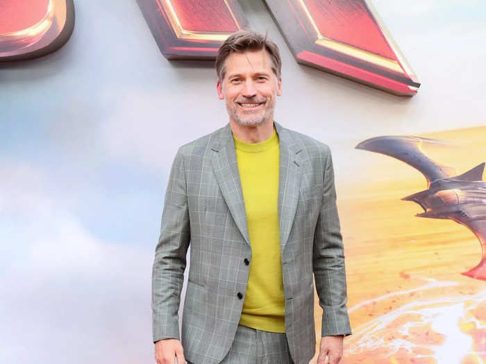 "Game of Thrones" alumni Nikolaj Coster-Waldau showed up for the premiere in a casual suit and sweater combo.
