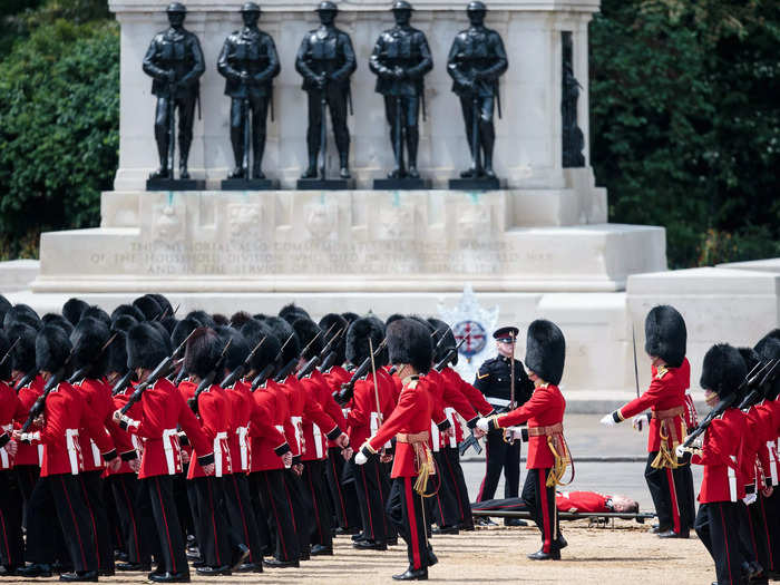 Another guard was carried on a stretcher after fainting during the Trooping the Colour parade in 2017.