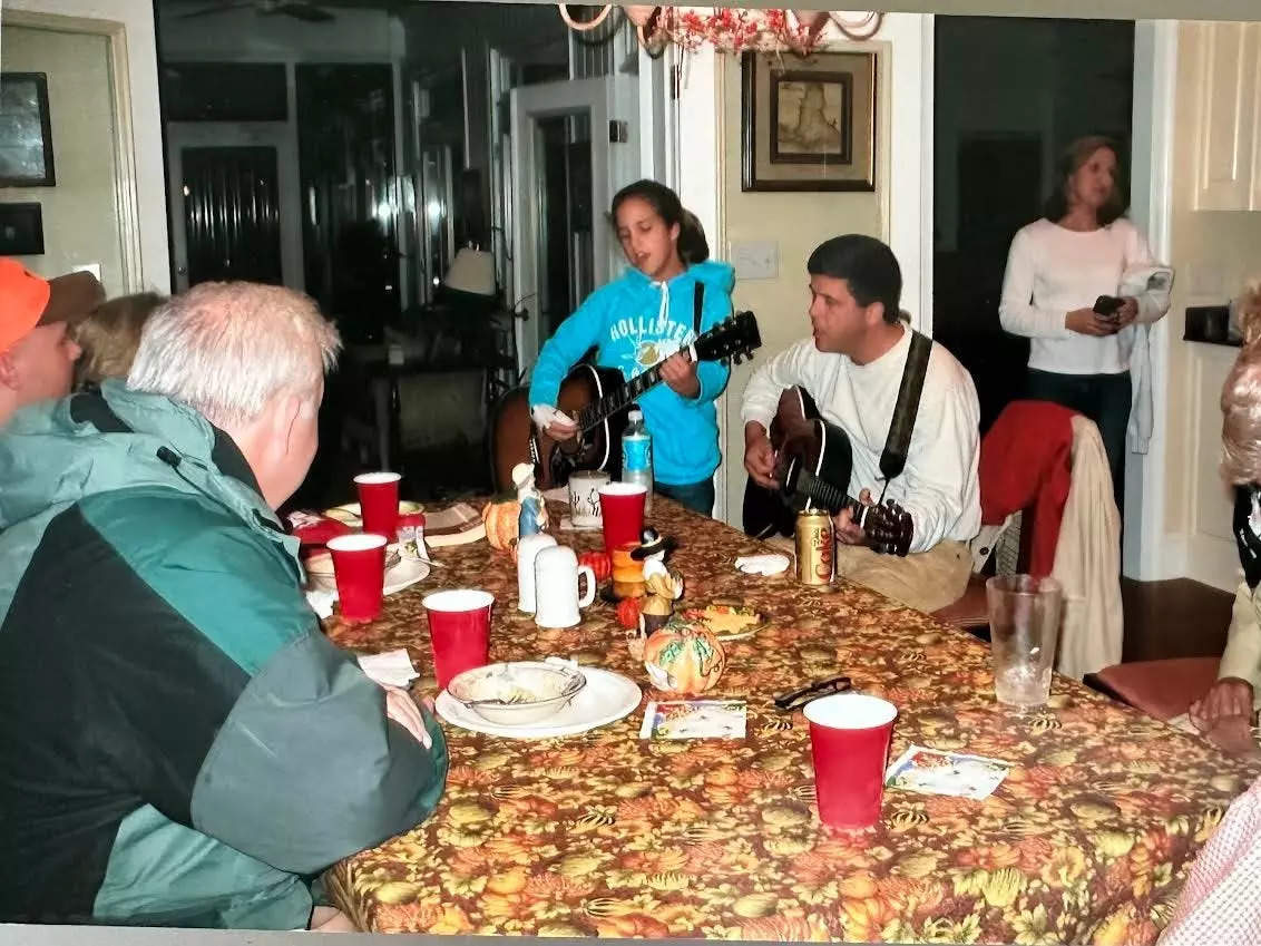 Old photo of family around a table