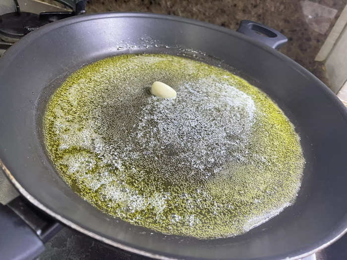 Next, heat the oil and butter in a large pan.