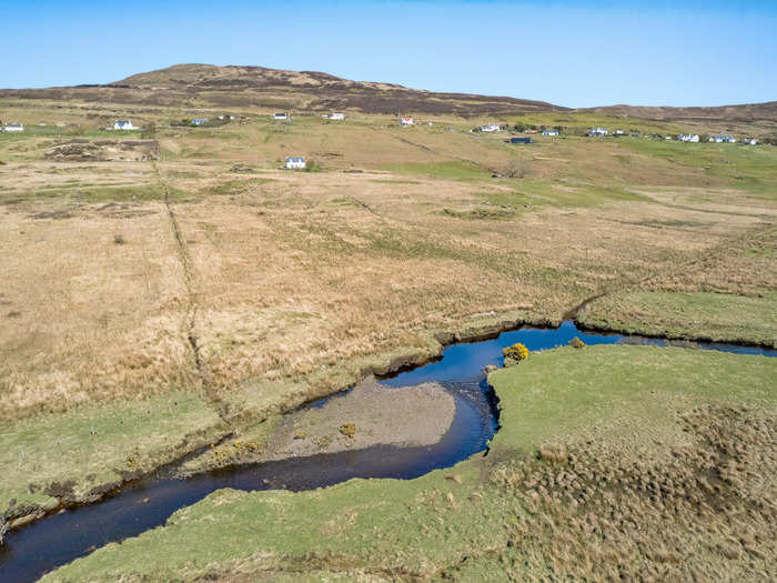 The property includes a river, along with fishing rights for salmon and trout.