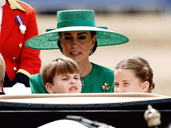 And turned around in the carriage to check out the spectators.