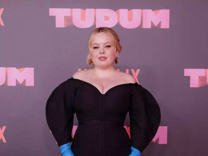 Nicola Coughlan, the leading star of "Bridgerton" season three, stepped onto the Tudum red carpet in a structured black gown.