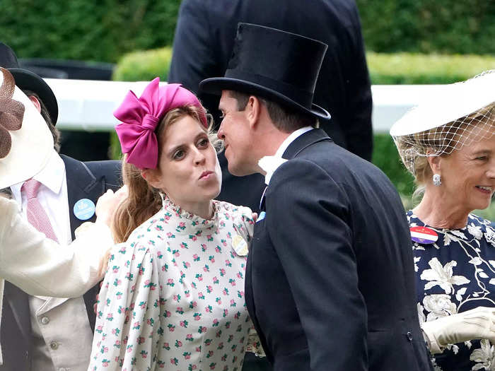 On Tuesday, Princess Beatrice wore a white high-necked dress by Beulah London with tiny pink flowers all over it.