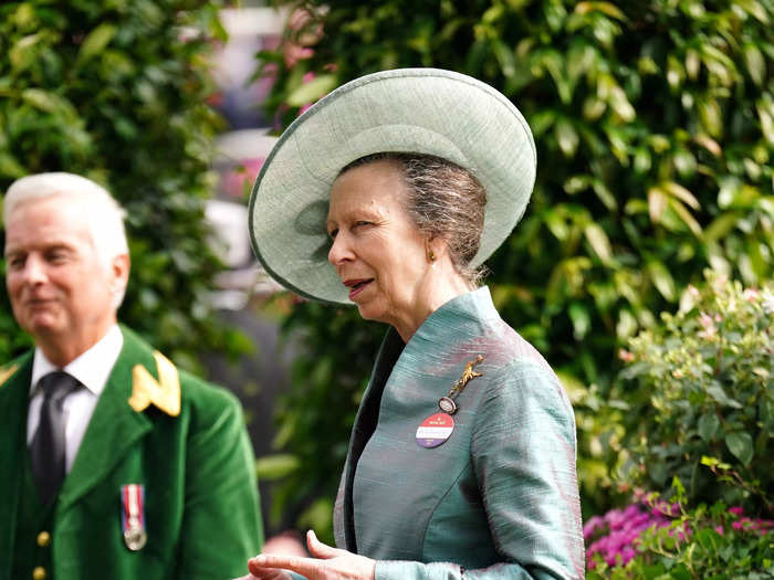 Princess Anne wore an iridescent teal coat to attend the first day of the event.