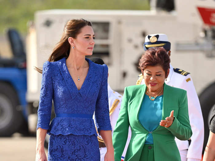 During the same Caribbean tour, Kate opted for a blue Jenny Packham suit for her arrival in Belize.