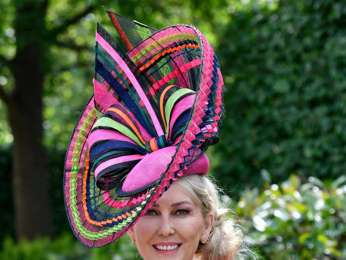 One racegoer wore a pink fascinator with tulle detailing and a giant bow.