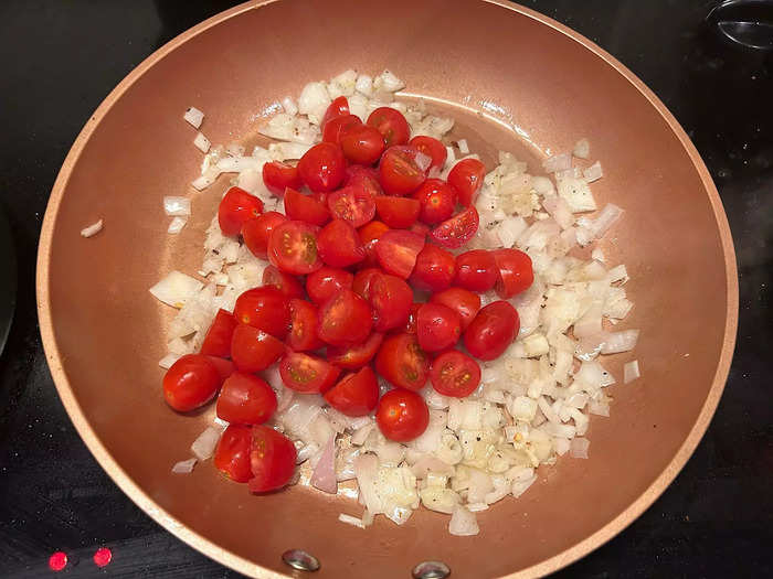 Once the two minutes were up, I added the cherry tomatoes to the pan.