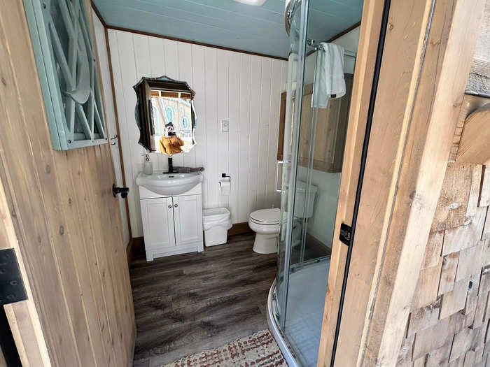 The outhouse is much nicer than I expected — the inside looked like a clean, luxurious hotel bathroom.