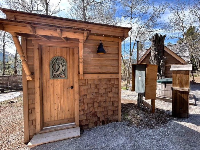 The outhouse is just a few steps away from the main building, and it