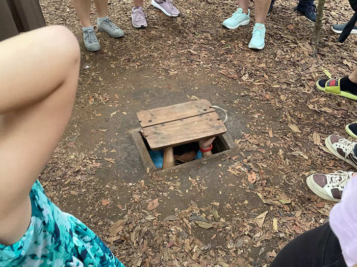 But our guide was less apprehensive, hopping into the tunnel and showing us how Viet Cong soldiers would enter while replacing the cover over the entrance.