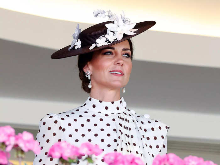 She also wore a saucer-style hat by Sally-Ann Provan and a pair of diamond-and-pearl earrings that had once belonged to Princess Diana.