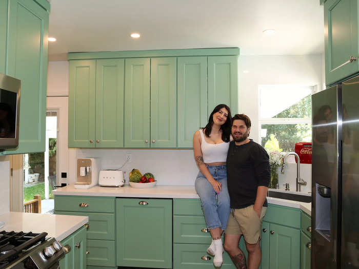 The kitchen received a complete makeover, including new appliances and cabinets.