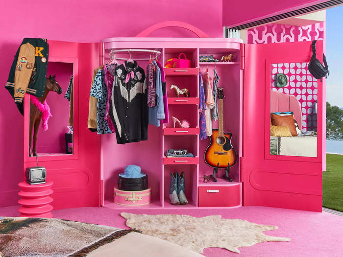 Like the house, the closet is very pink — and modeled after Barbie