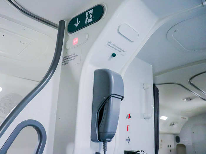 A phone in the rest area allows flight attendants to communicate with other members of the crew throughout the aircraft.