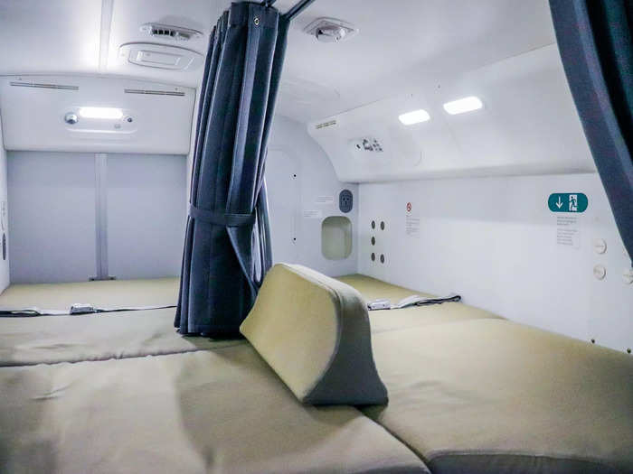 Each bunk is identical with a mattress pad accompanied by a pillow and blanket kit.