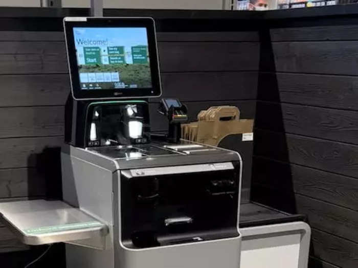 Self-checkout is located next to the Just Walk Out lane and at the front of the store for people who prefer to use a register.