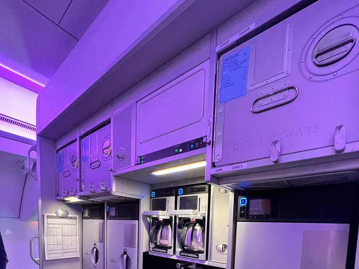 In between the sections, I caught sight of the galley where flight attendants prepare meals for passengers.