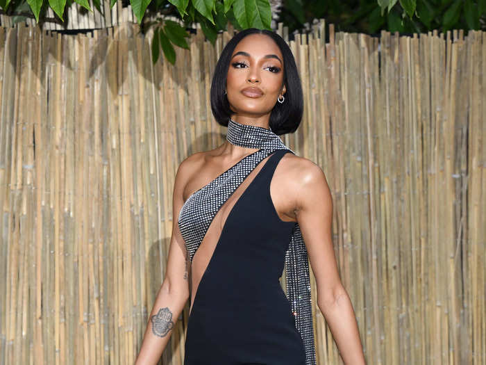 Similarly, Jourdan Dunn went for an all-black ensemble – hers featured a bedazzled built-in scarf.